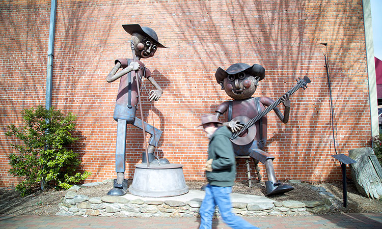 These “Old Time Music” fiddlers are among the most popular public art pieces in Waynesville.