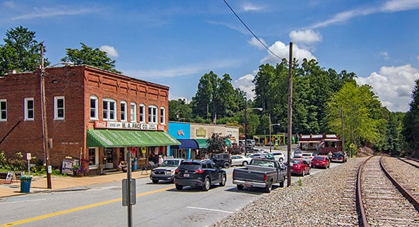 the main street of quaint storefronts in Saluda, NC